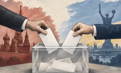 Un’urna elettorale trasparente con due schede anonime, illustrazione del ballottaggio presidenziale in Bulgaria.