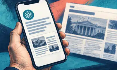 Uno smartphone mostra una risposta AI con una scheda-fonte anonima dall’aspetto di una pagina di giornale locale.