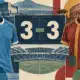 Maglie azzurra e giallorossa ai lati di un tabellone con il risultato 3-3