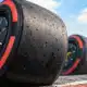 Illustrazione di una gomma slick da Formula 1 con una lieve irregolarità superficiale, riferimento al graining osservato nelle prove del Gran Premio di Città del Messico.